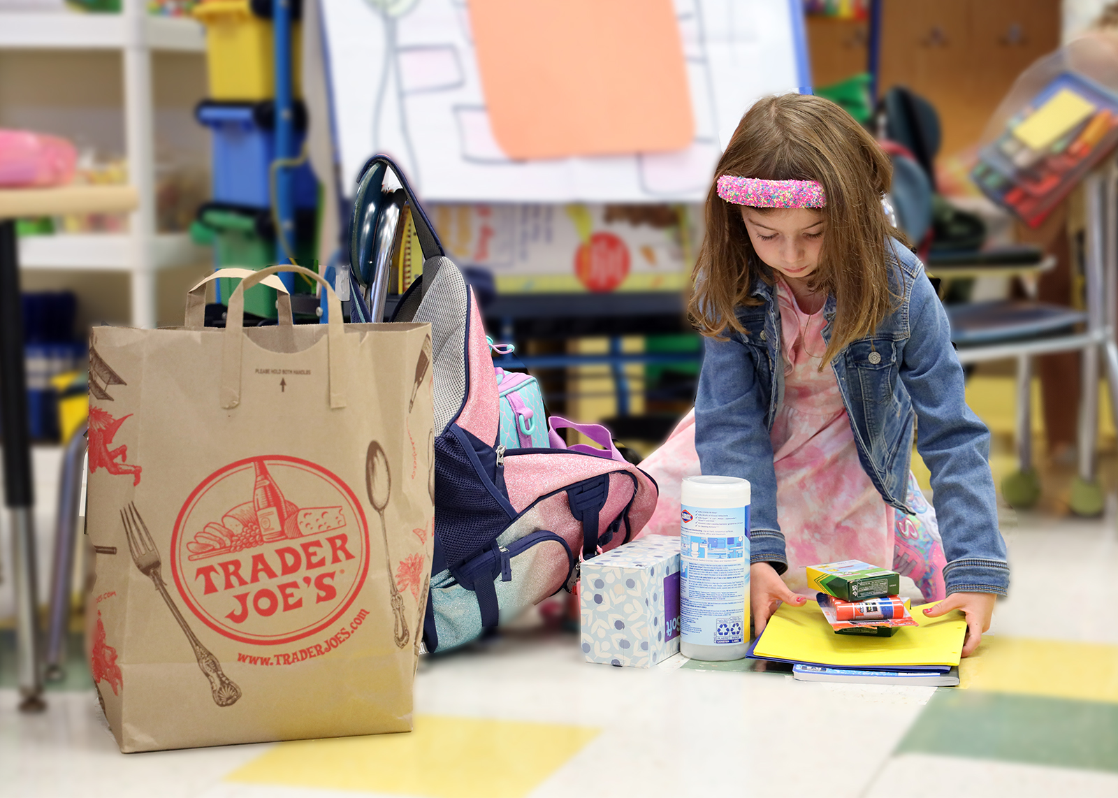 students studies school supplies on the floor