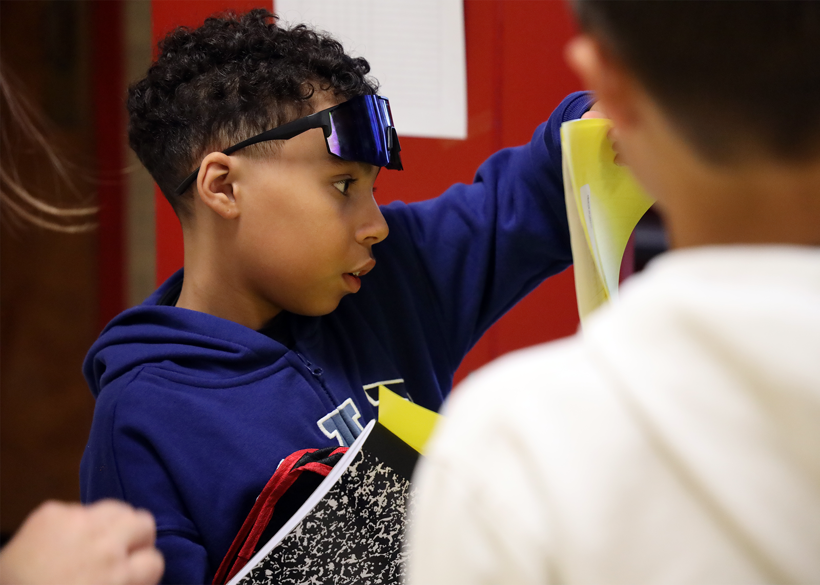 middle schooler looks over schedule