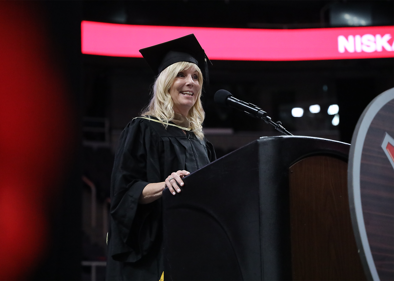 HOF speaker at podium during 2024 graduation