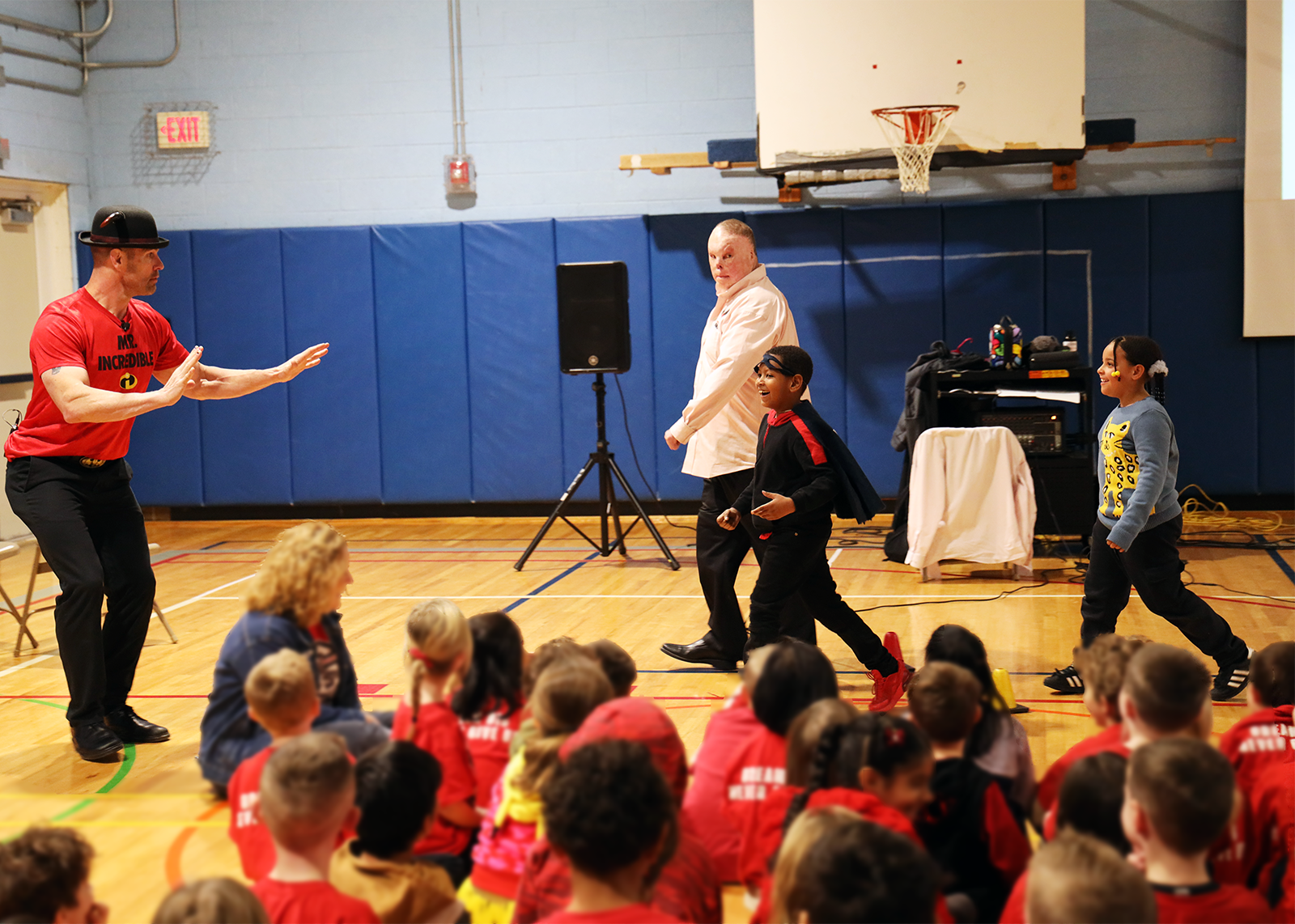 two students participate in presentation in gymnasium