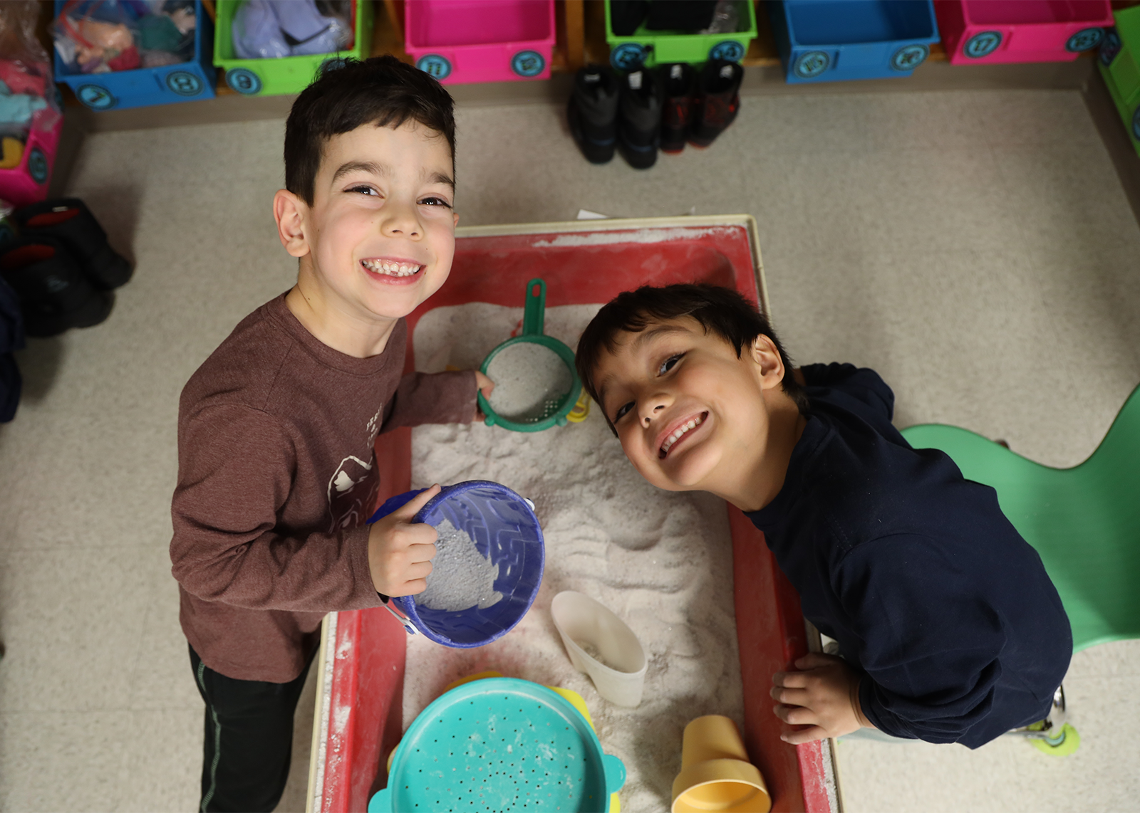 kindergarten friends at sand table