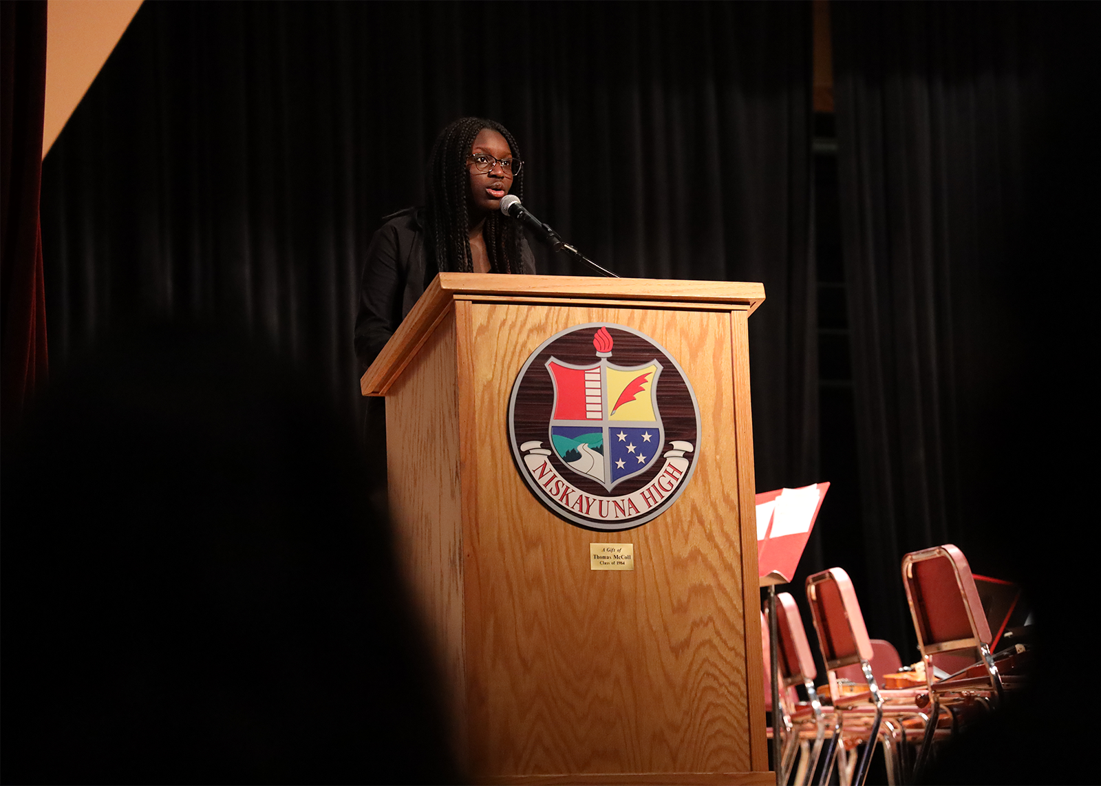 HS student at podium giving a speech