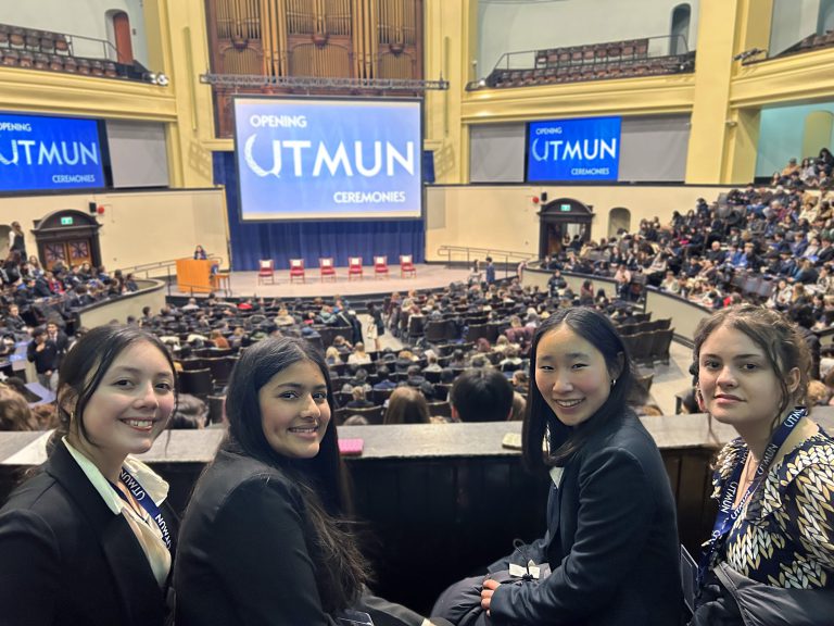 NHS students pose for photo at University of Toronto Model United Nations 2025 Conference.