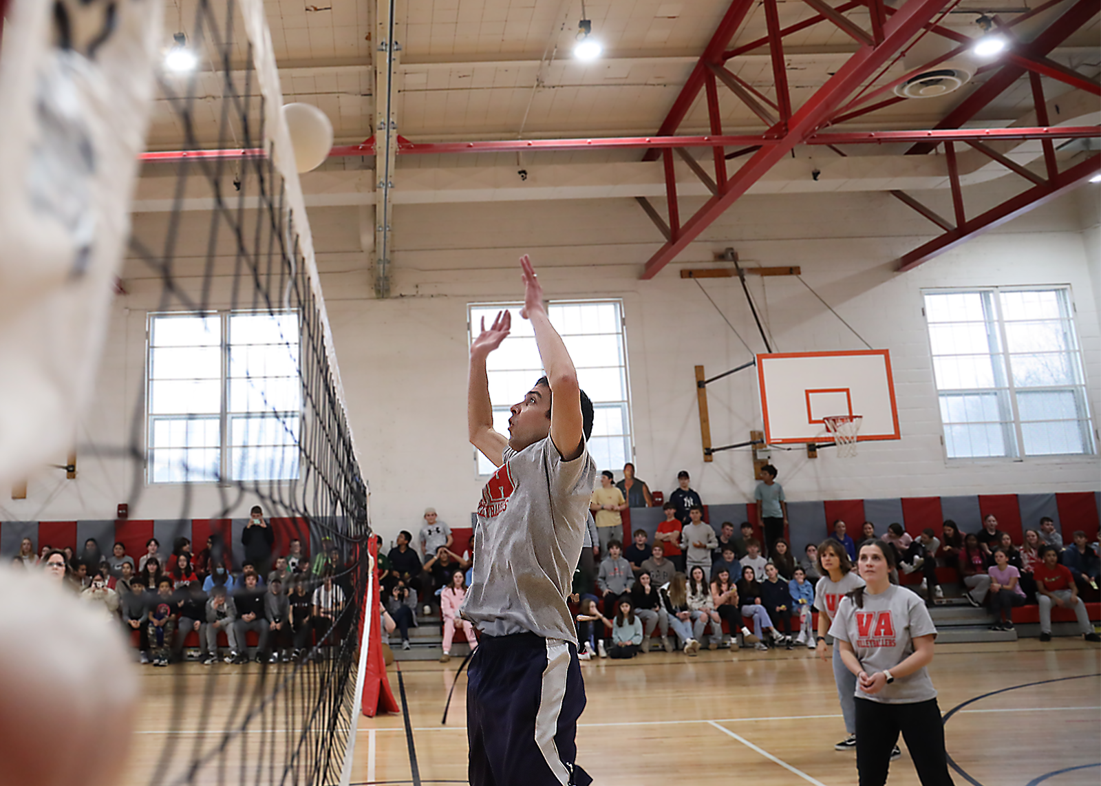 staff volleyball game player a tnet